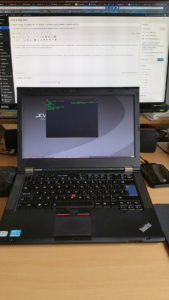 Laptop with additional monitor connected.