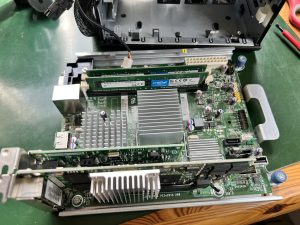 HP Microserver N54L mainboard with PCIe network cards installed
